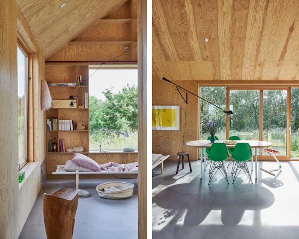 houten vakantiewoning met grote ramen en gietvloer